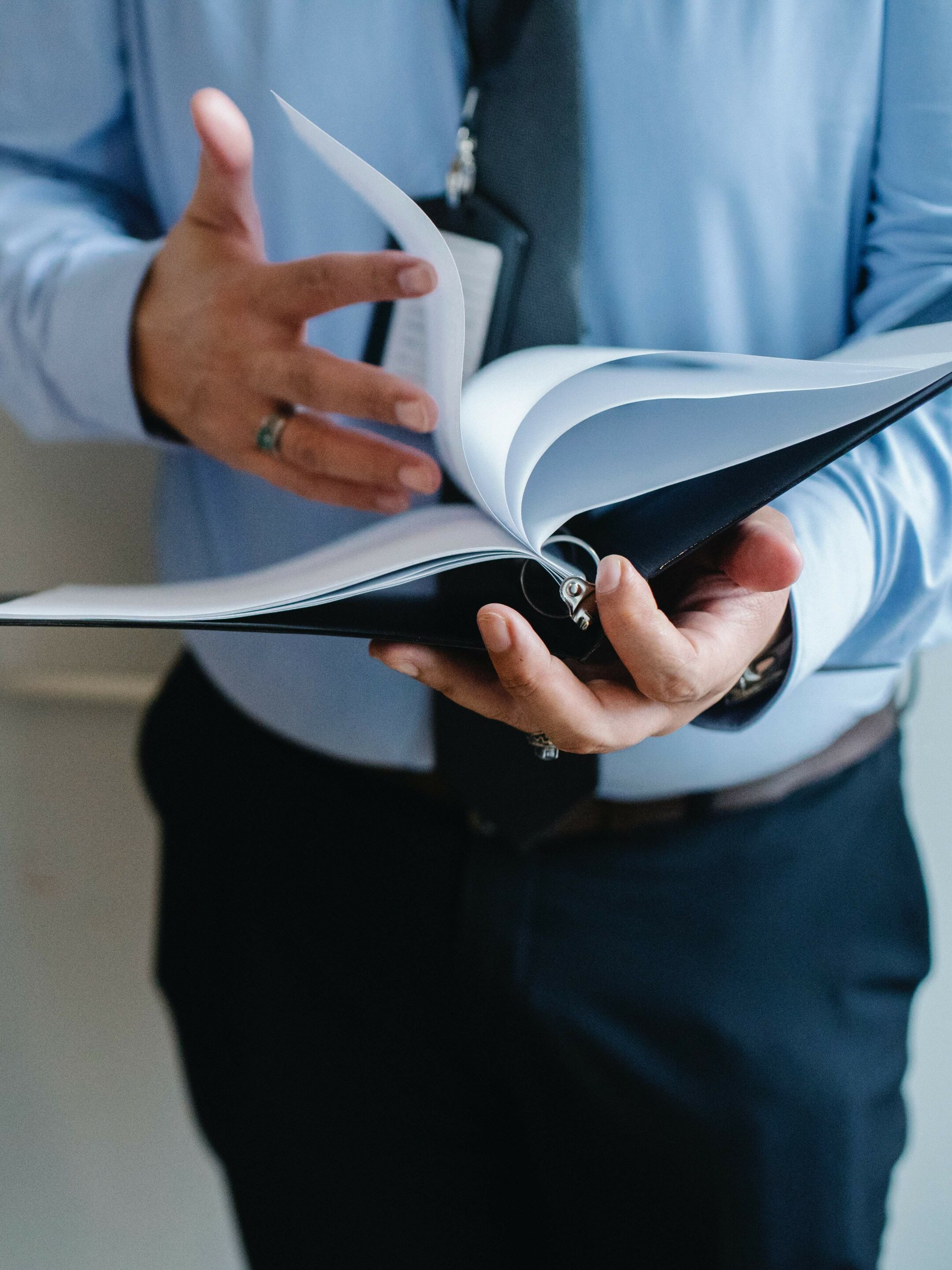 Lawyers in Mountbatten Reading Documents In Office